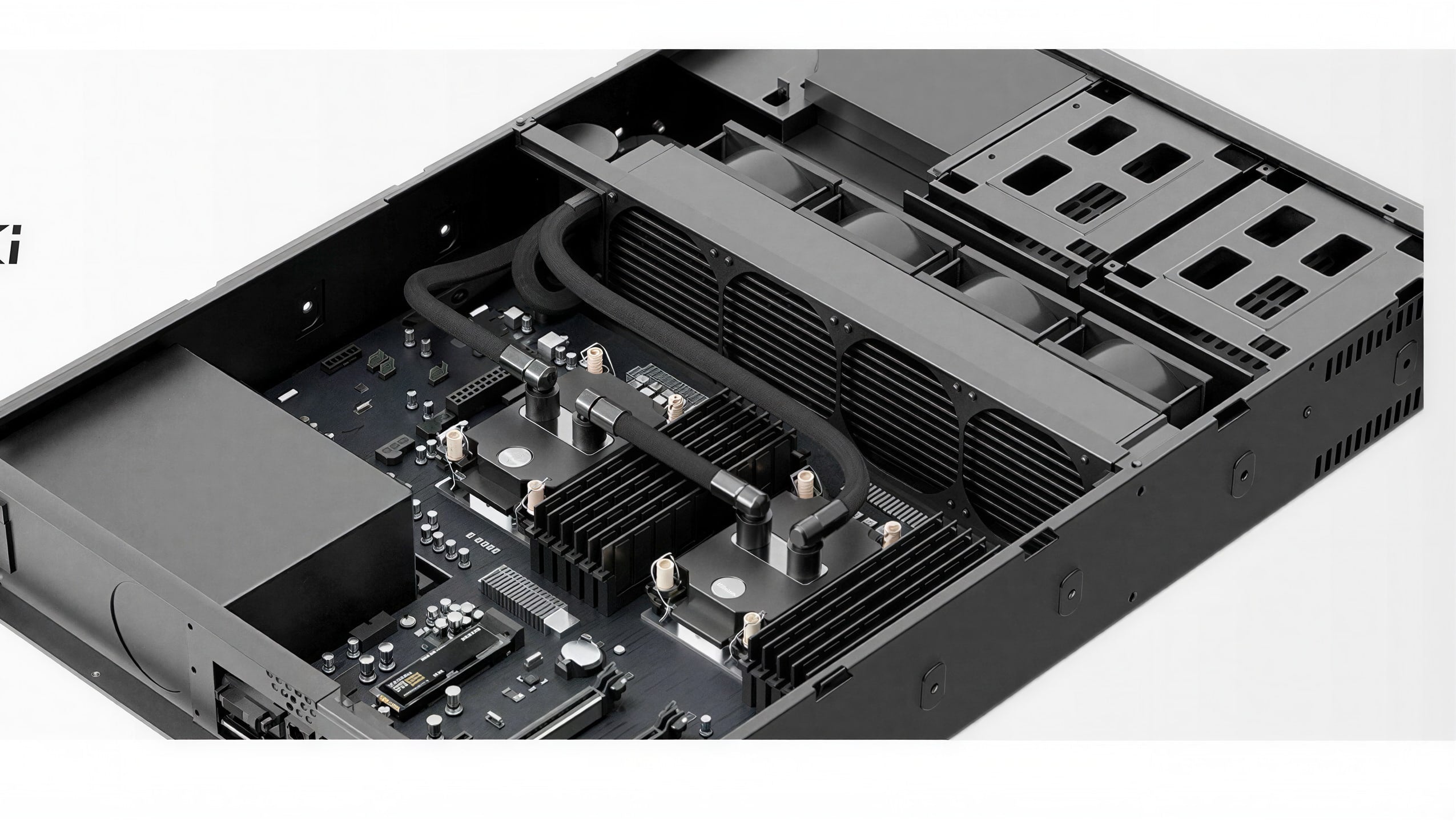 The 4 x 80 mm kit installed in a 2U chassis: two blocks on the sockets, the radiator and its four fans across the airflow path at the back